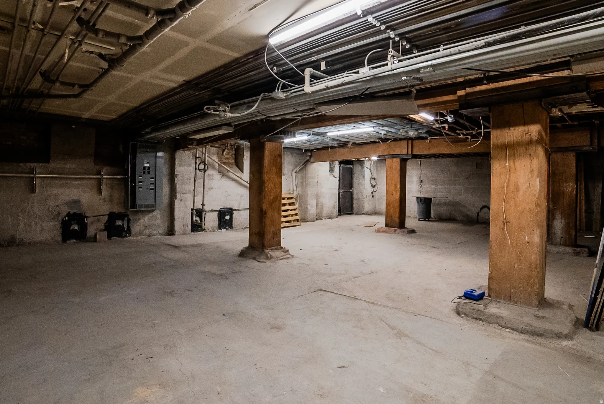 Unfinished basement with stairway