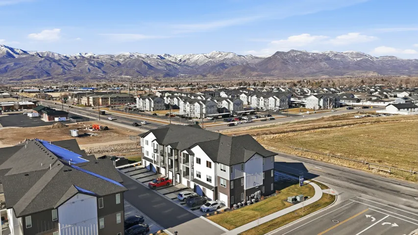 Aerial view of residential area with a mountain backdrop