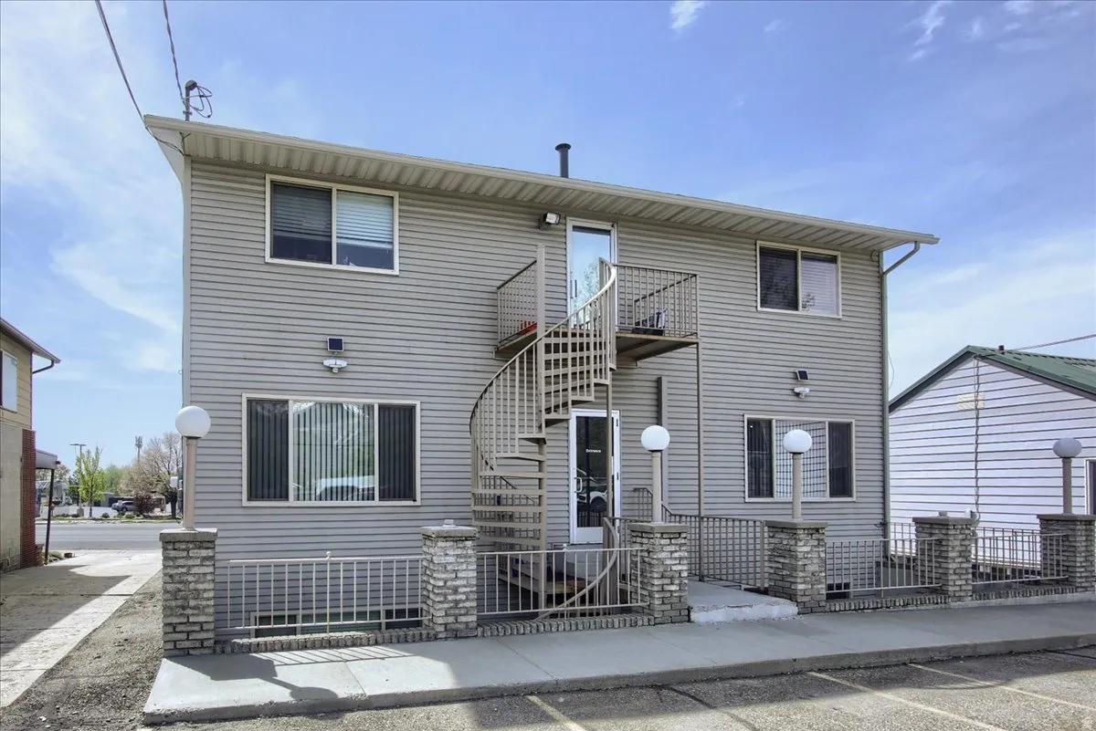 Traditional-style home featuring stairway