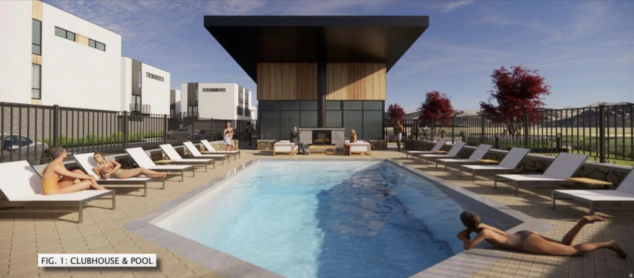 Community swimming pool featuring a paved deck with multiple lounge chairs
