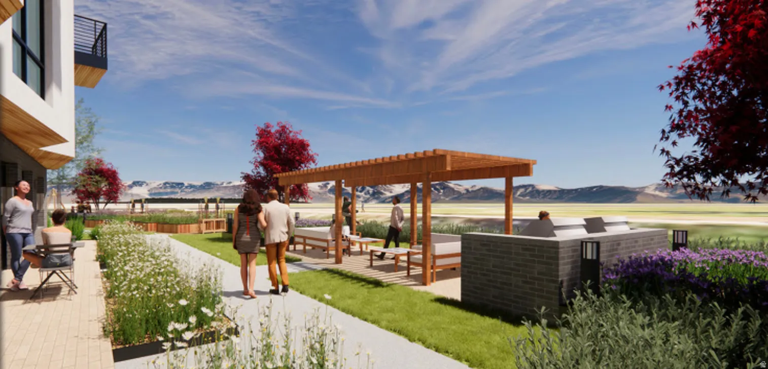 Outdoor amenity space featuring a timber pergola, built-in seating, a dedicated grilling station, manicured lawn, and paved walkways