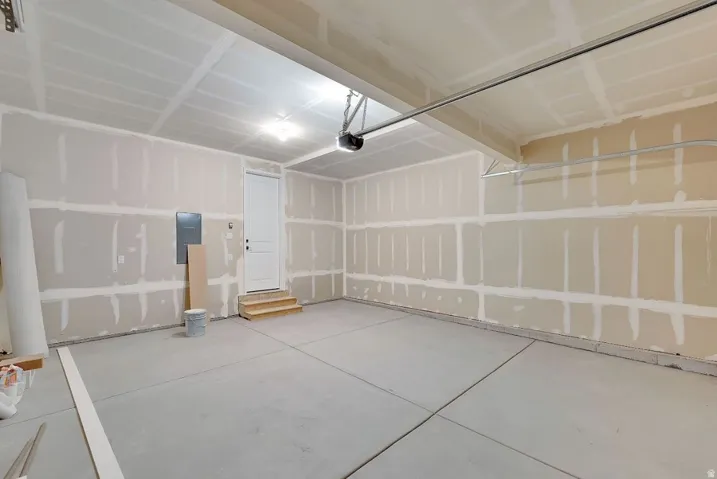 Garage featuring electric panel