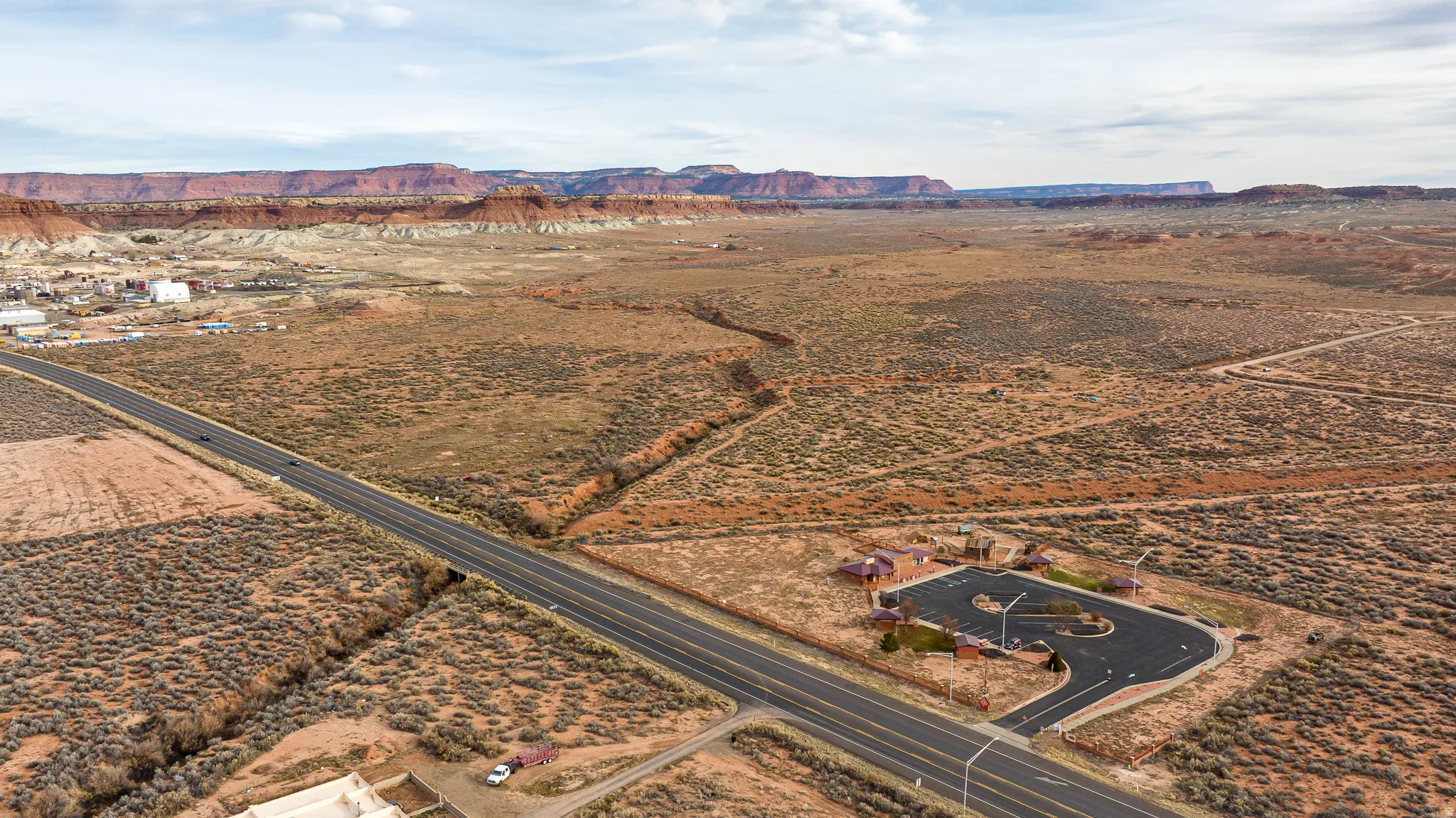 Overview of rural landscape featuring a mountain backdrop