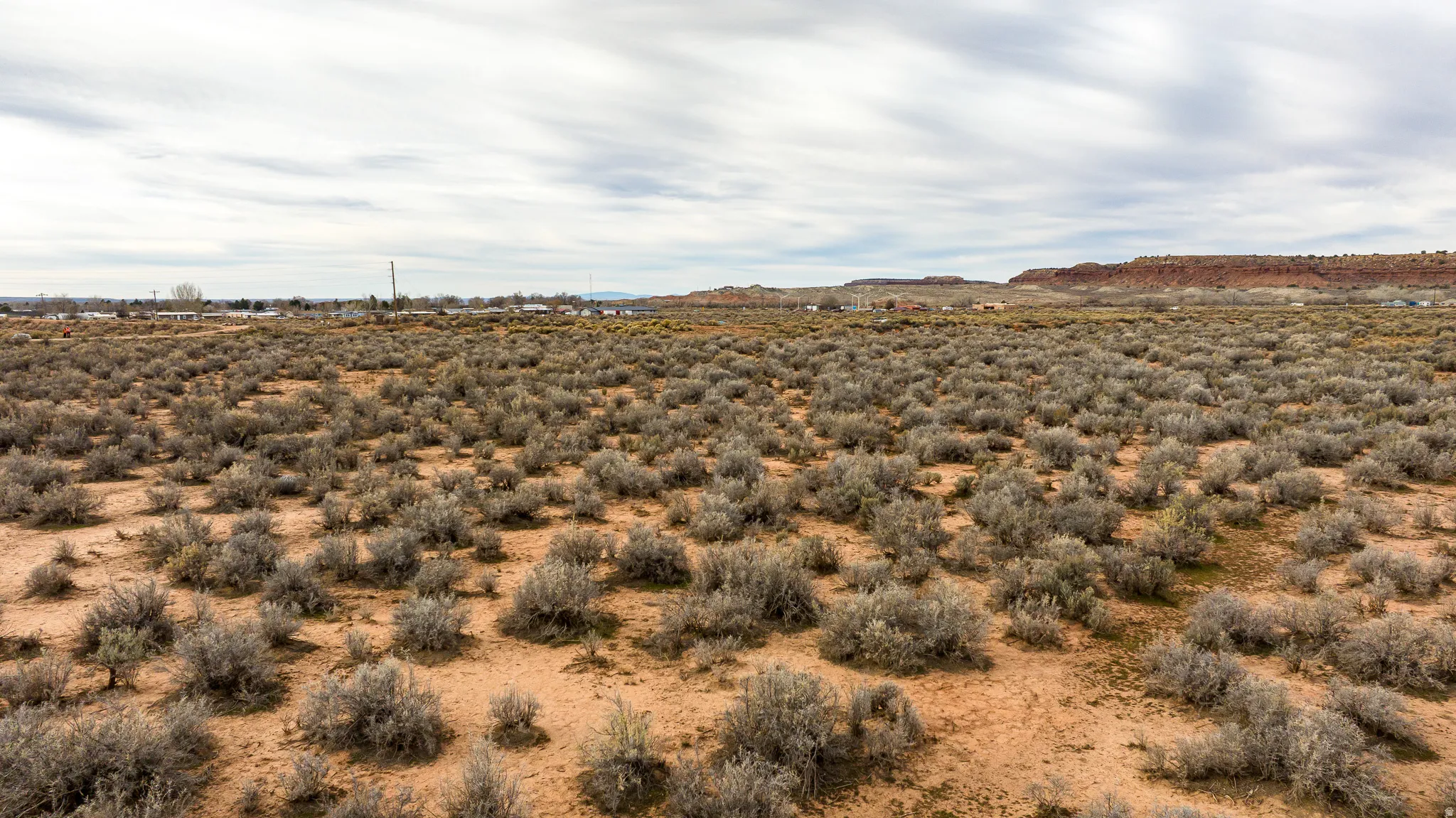View of mountain backdrop featuring rural landscape
