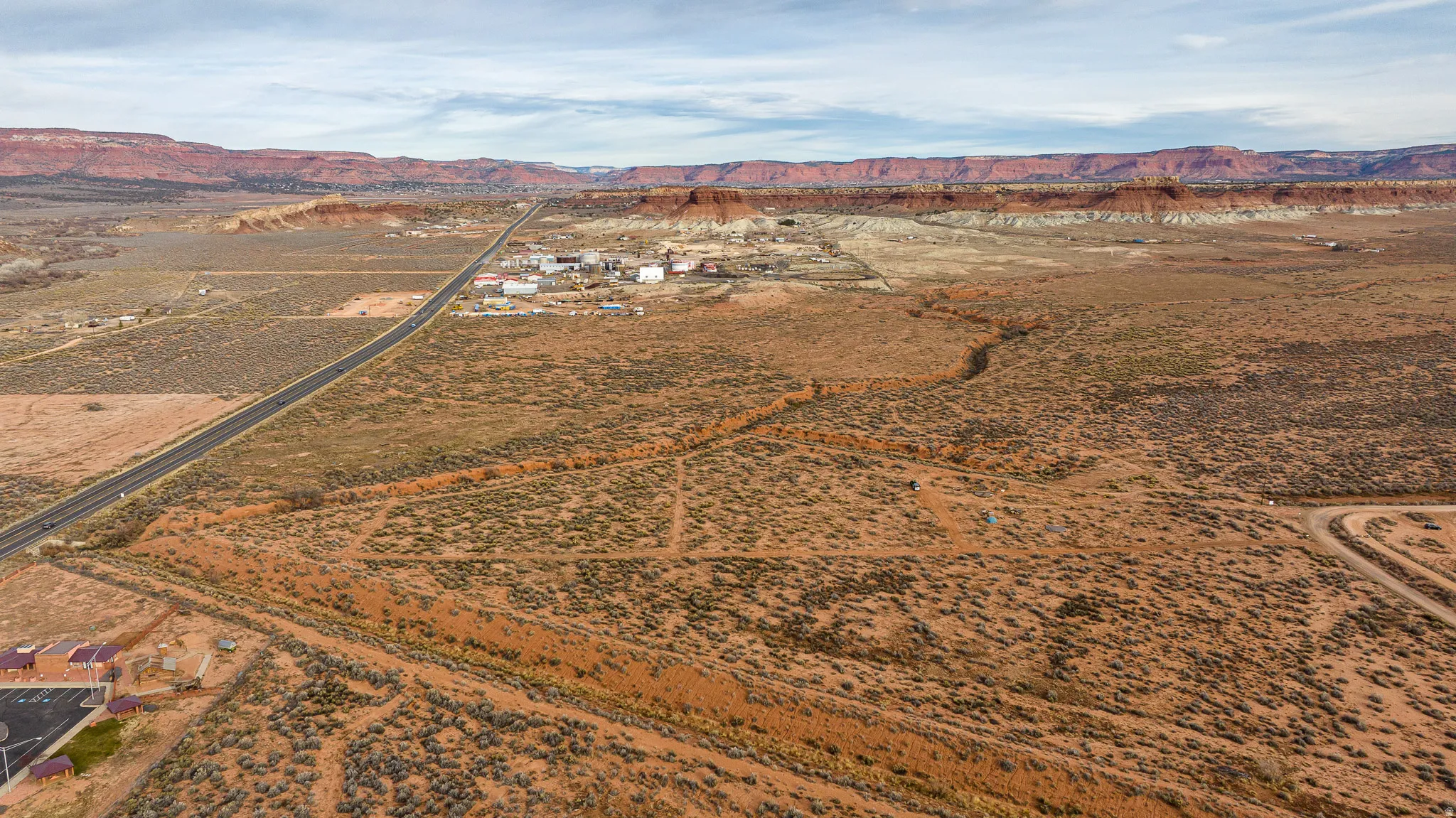 Aerial view of property and surrounding area with rural landscape