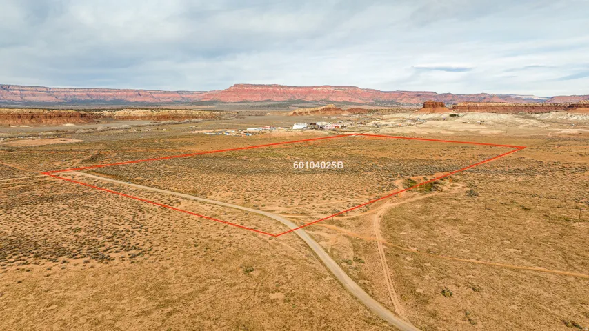 View of rural area with property parcel outlined and mountains