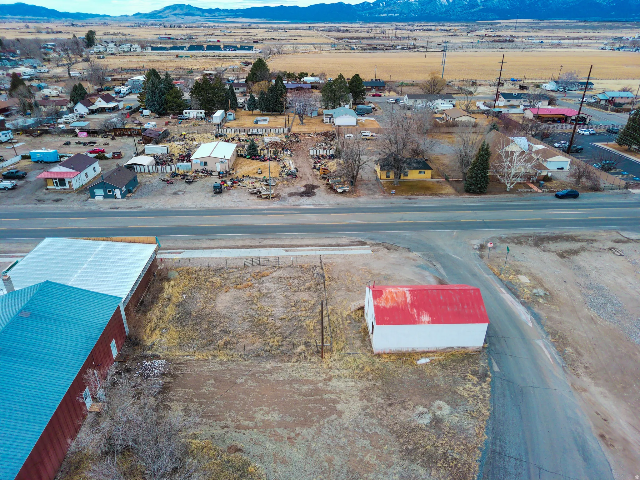 Aerial view of industrial structures and mountains