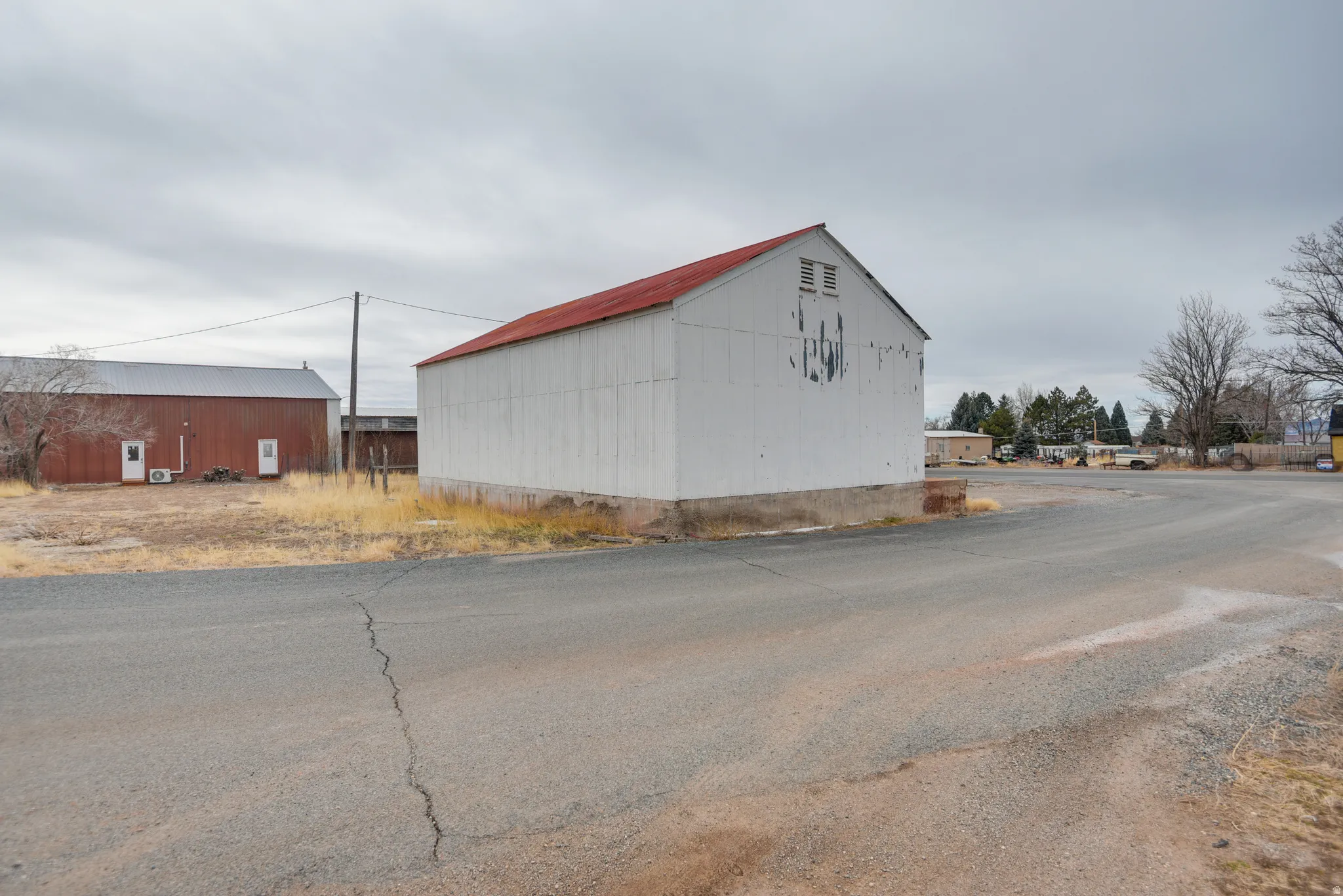 View of building exterior featuring a pole building