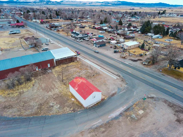 Drone / aerial view of an industrial area and a mountain backdrop