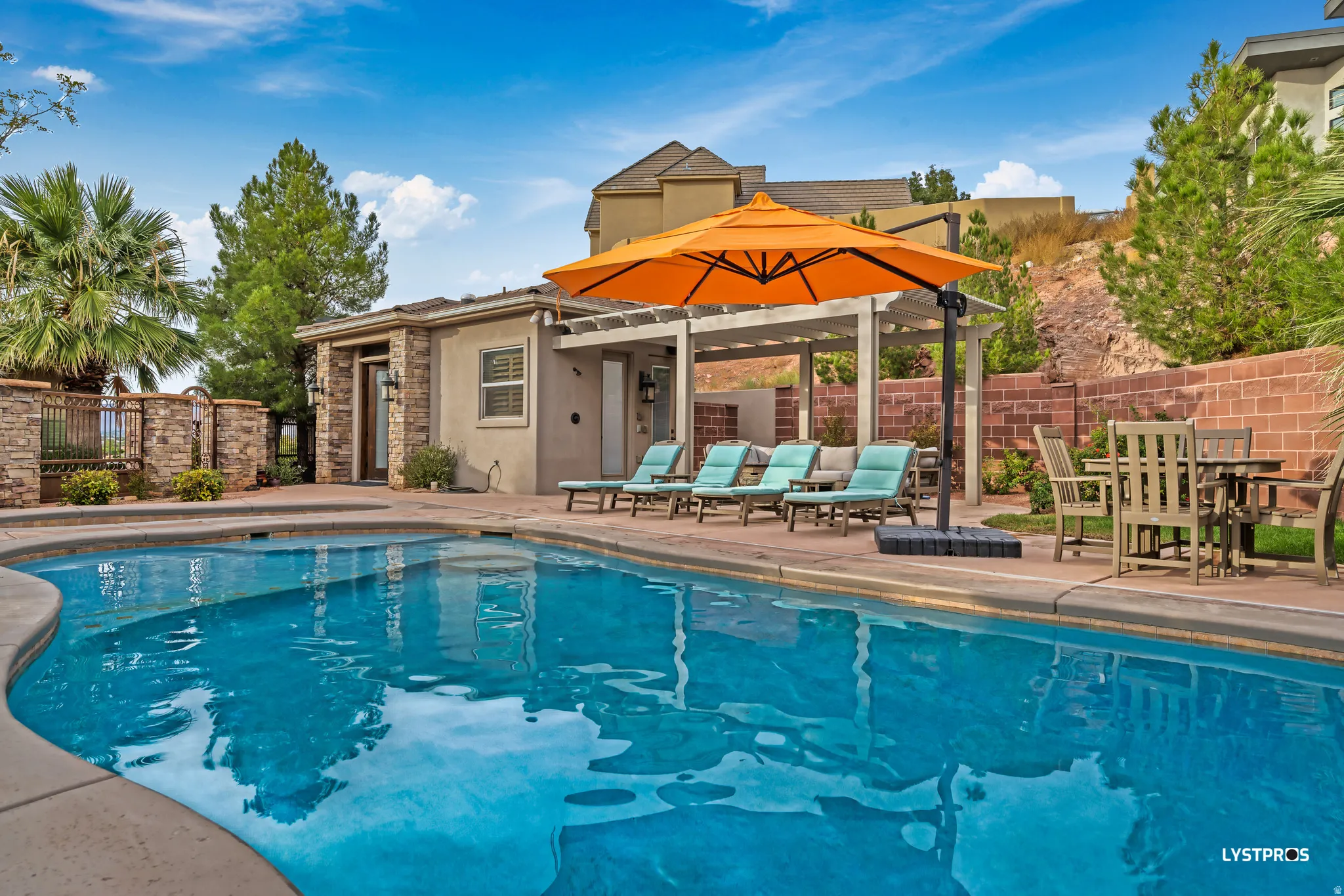 View of pool featuring a fenced backyard and a patio area
