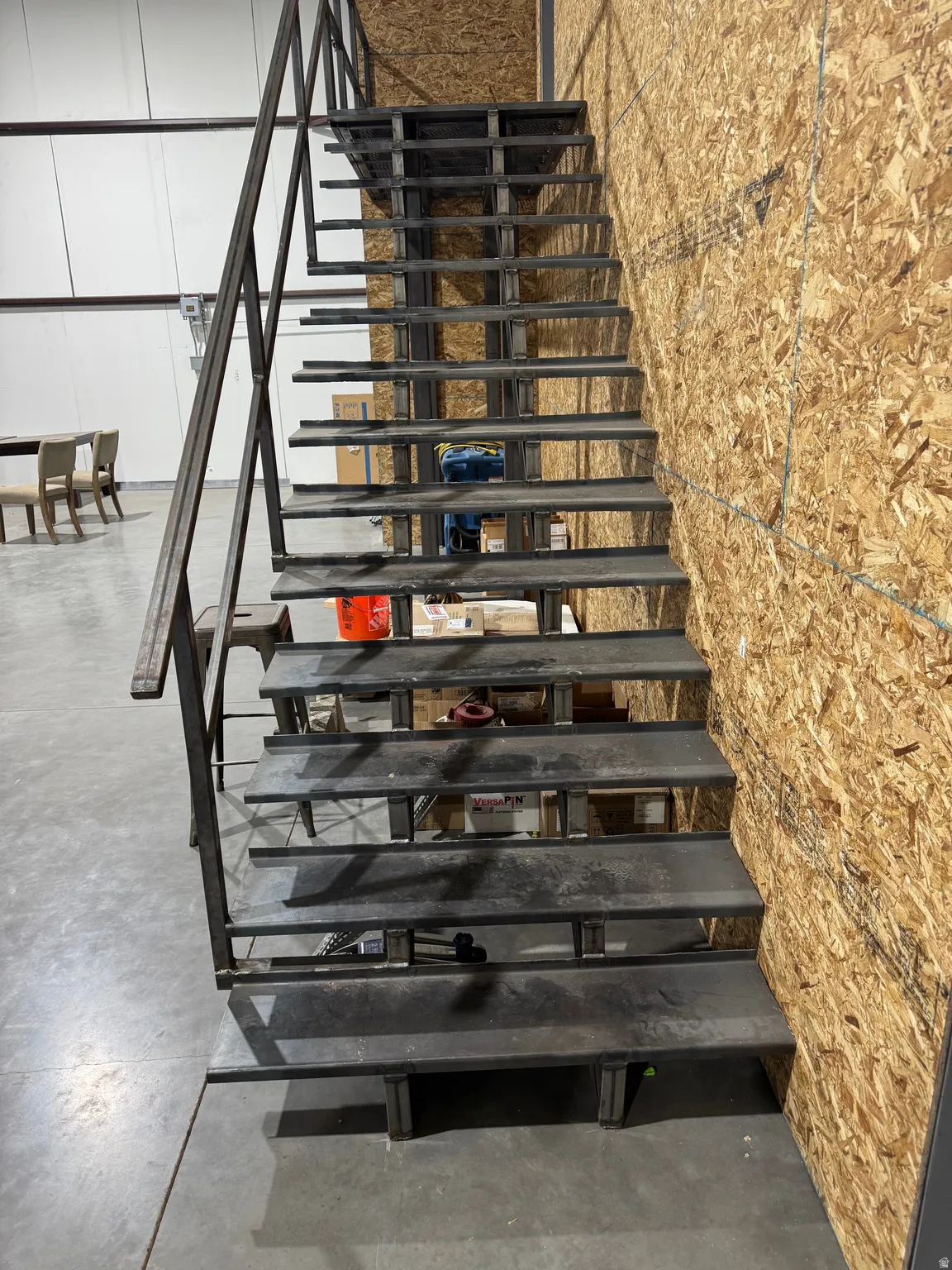 Stairs with finished concrete flooring