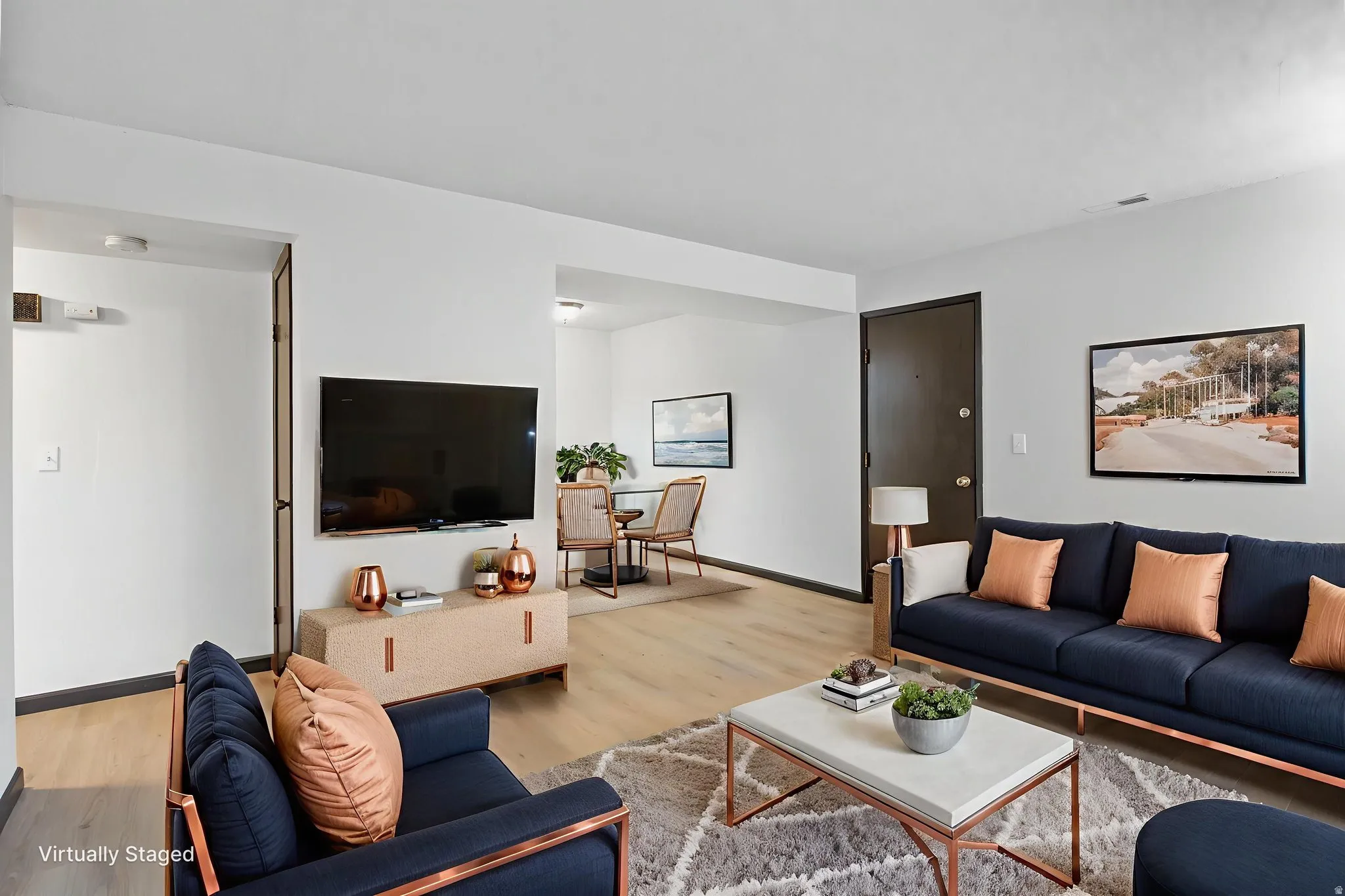 Living room with wood finished floors and baseboards