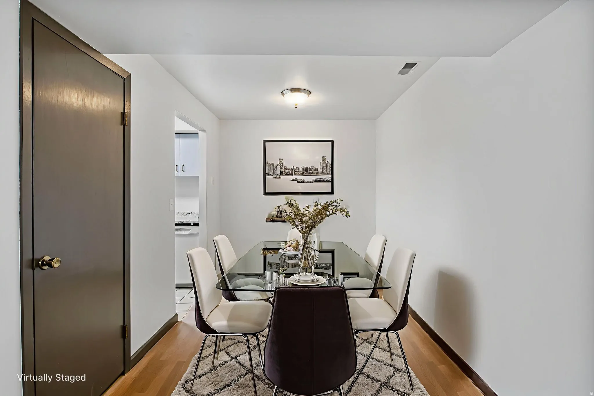 Dining space with light wood-type flooring
