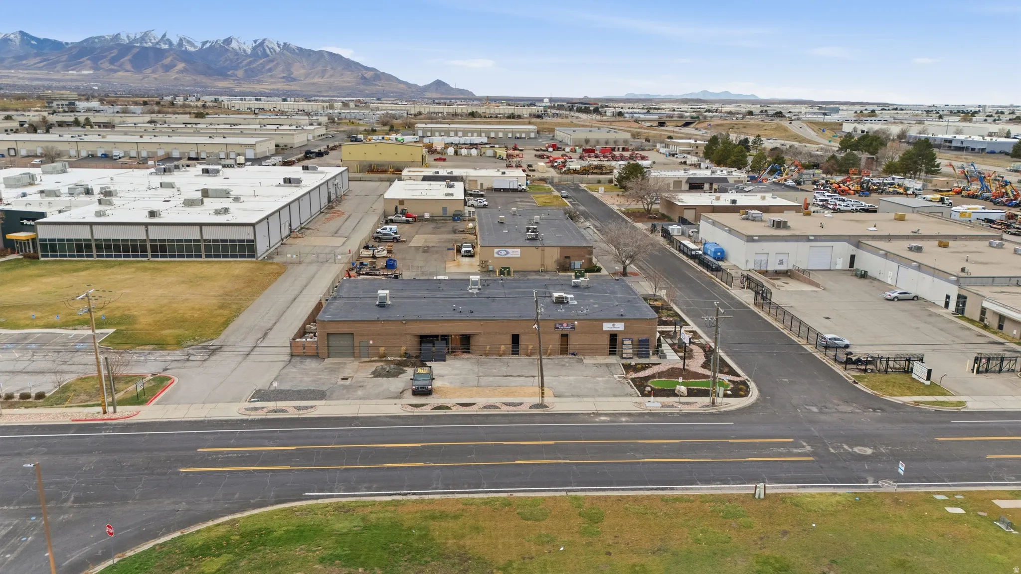 Aerial view of industrial structures and mountains