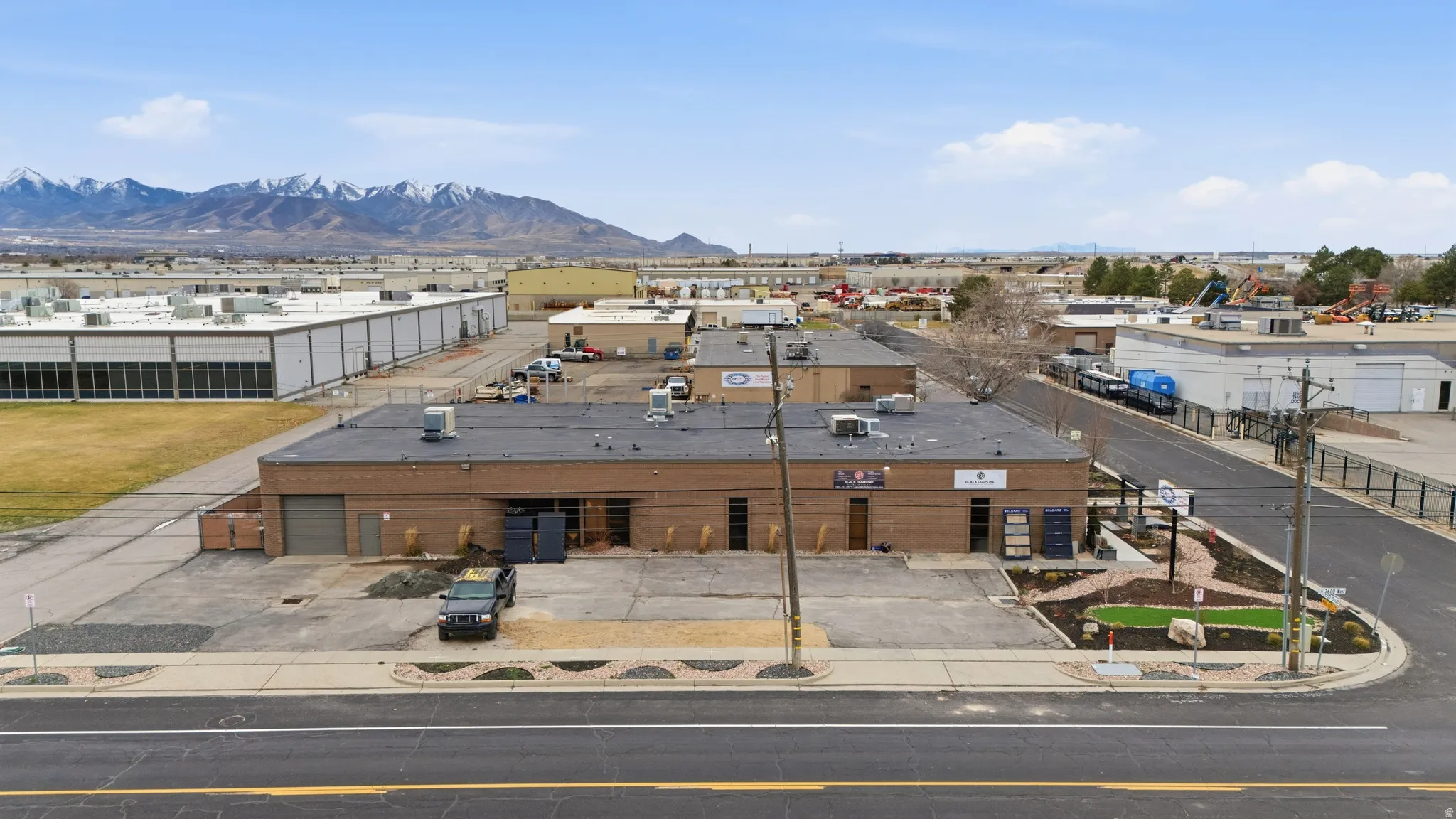 Aerial view of industrial structures and mountains