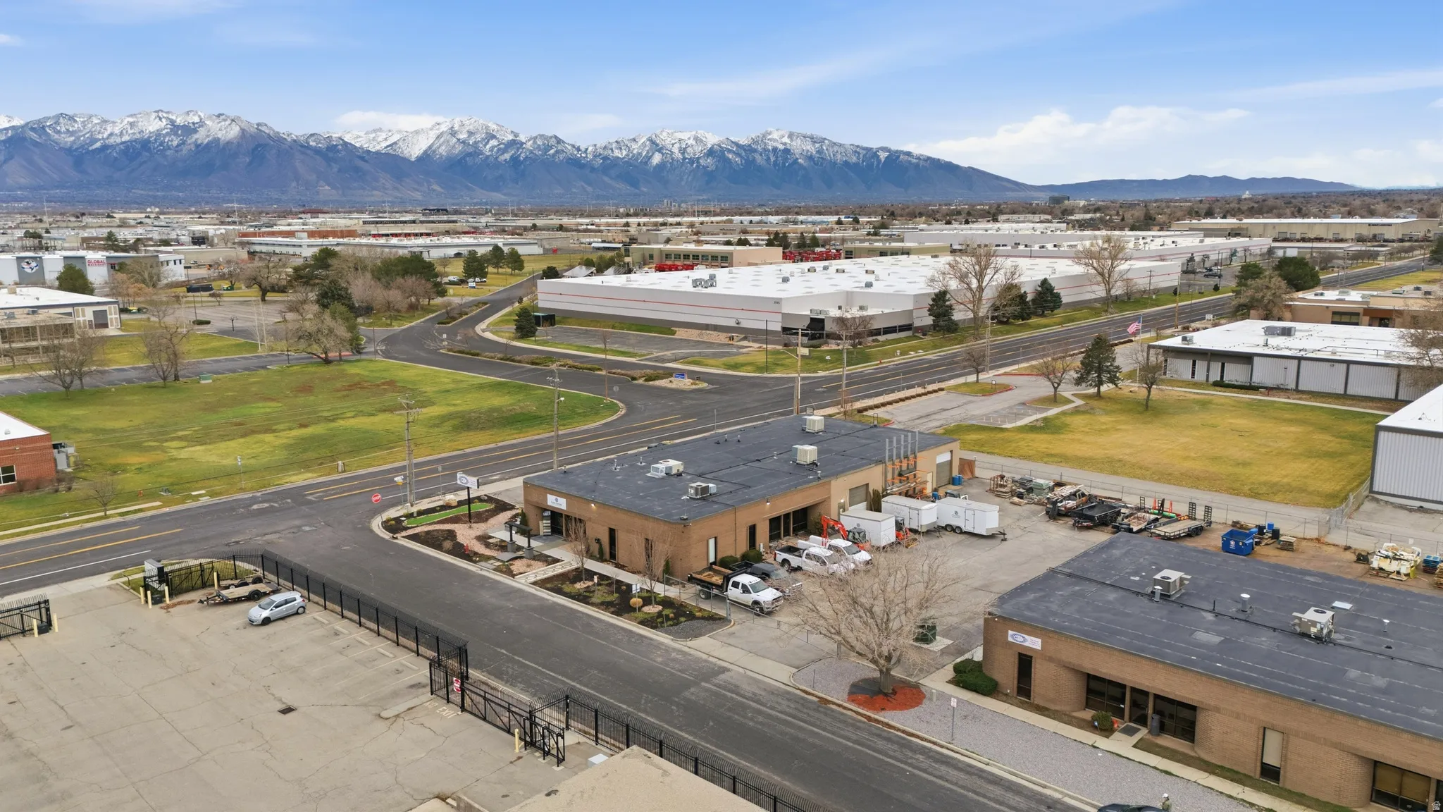Aerial view of an industrial area and a mountain backdrop