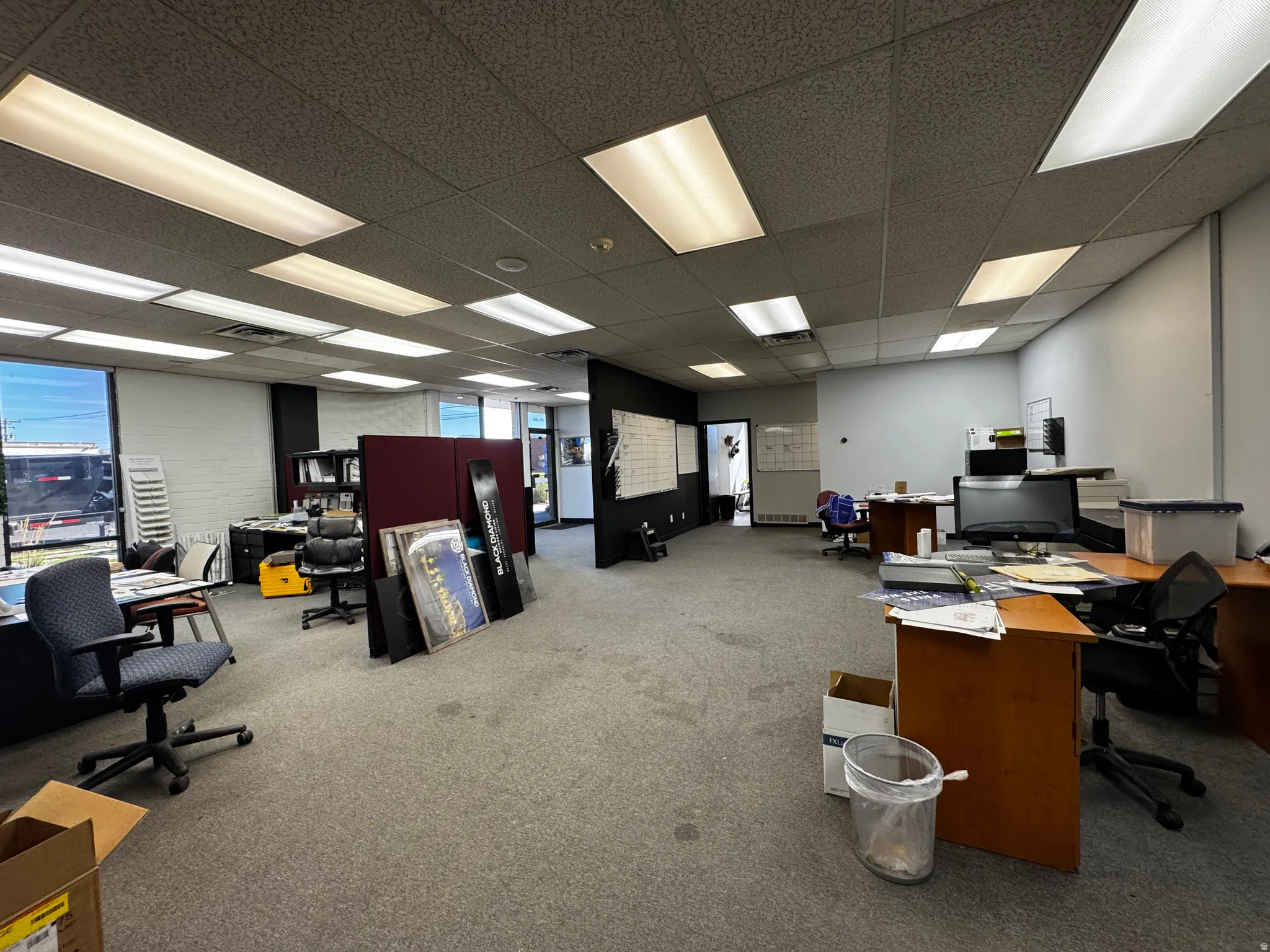 Office featuring a drop ceiling