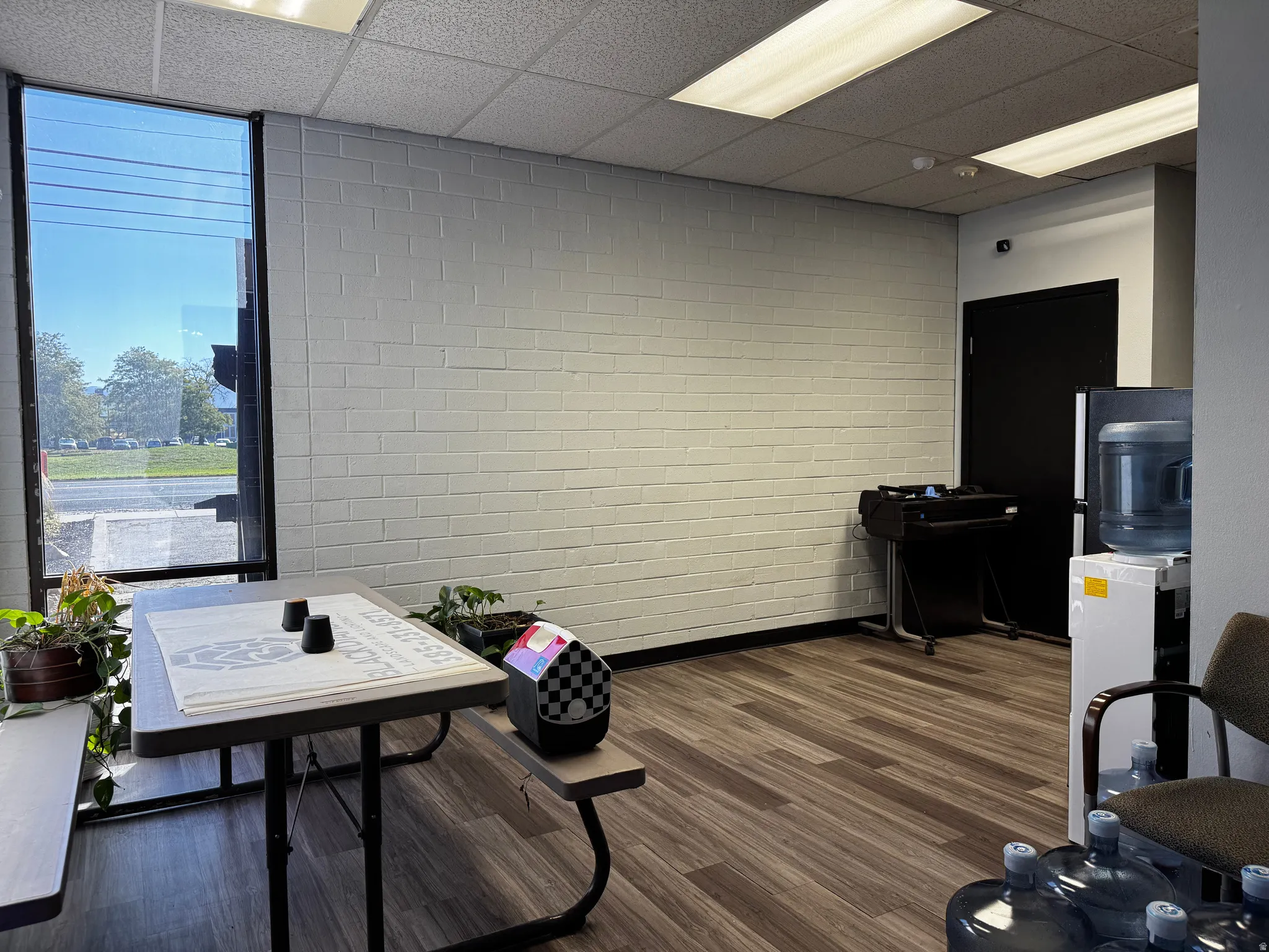 Home office featuring a drop ceiling