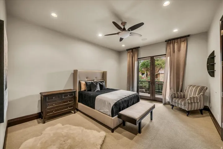 Carpeted bedroom featuring access to exterior, recessed lighting, and ceiling fan
