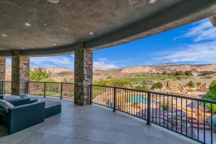 View of patio with a mountain view and an outdoor living space