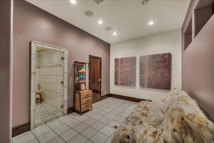 Entrance foyer featuring recessed lighting and light tile patterned floors