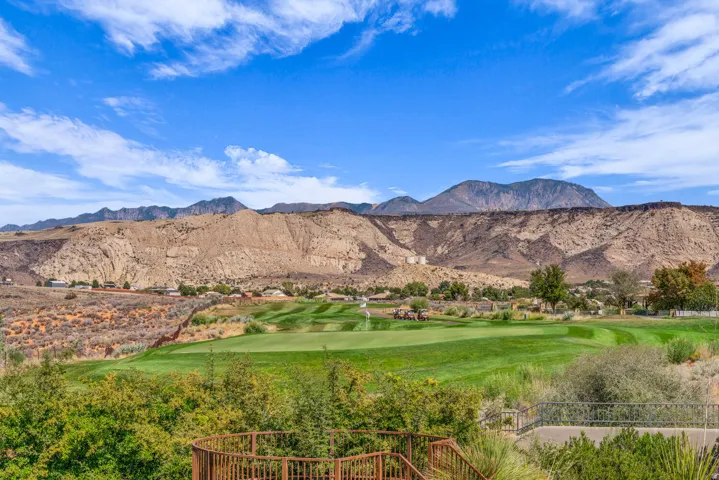 View of mountain background featuring a golf club