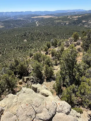 Aerial view of property's location with a mountainous background