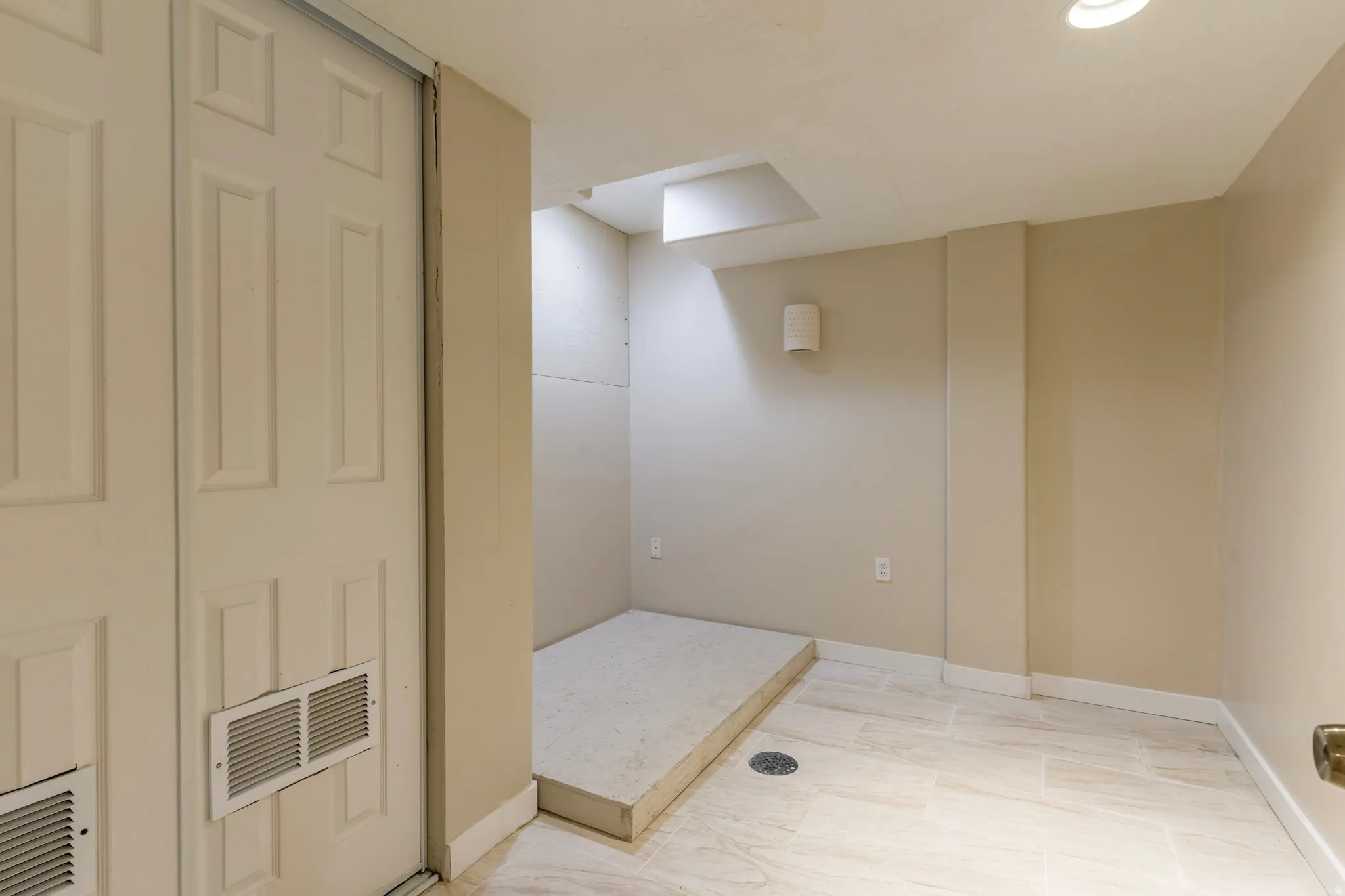 Bathroom featuring baseboards