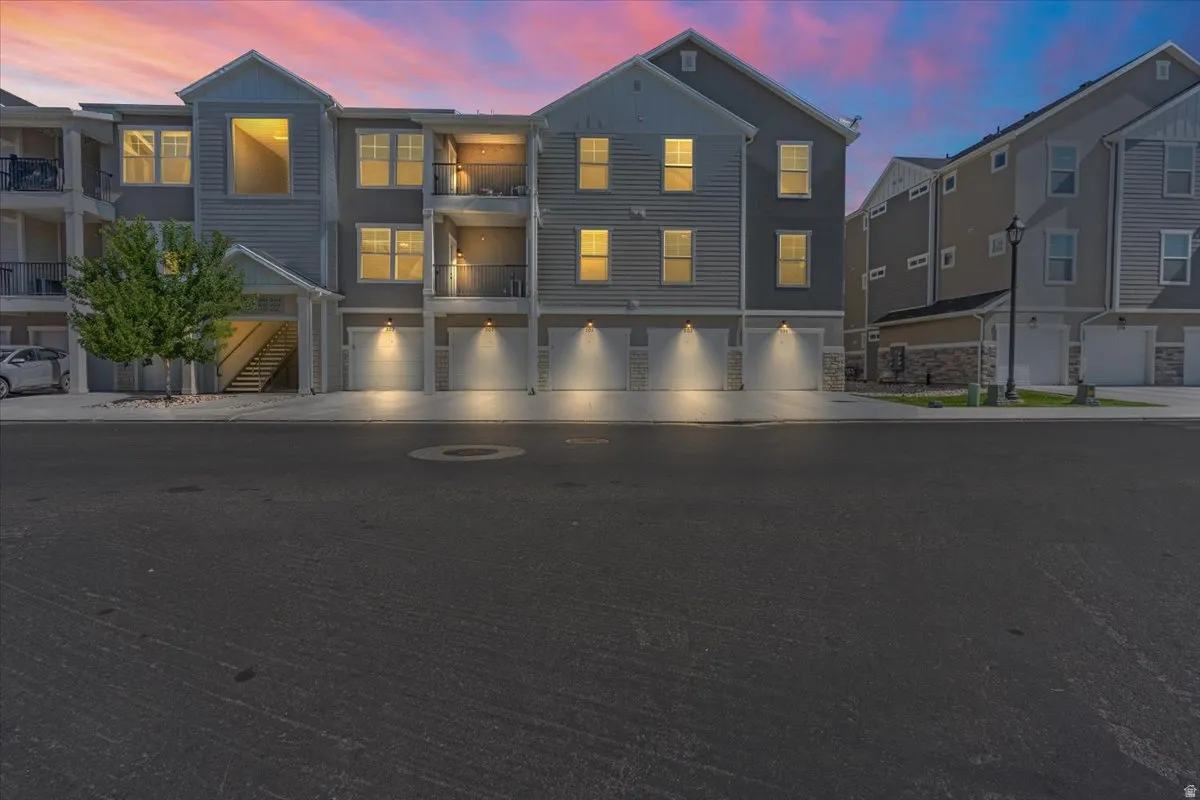 View of front of house with board and batten siding
