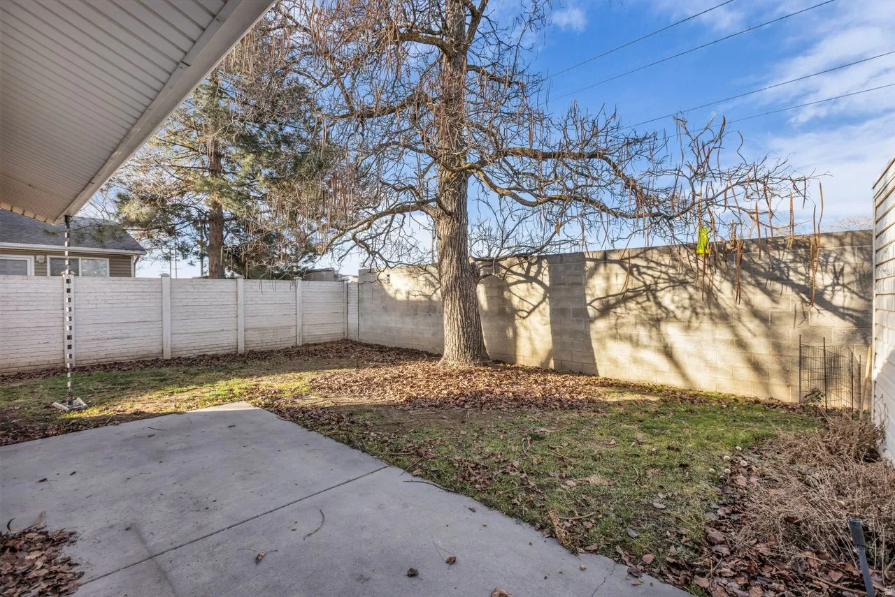 Fenced backyard featuring a patio area