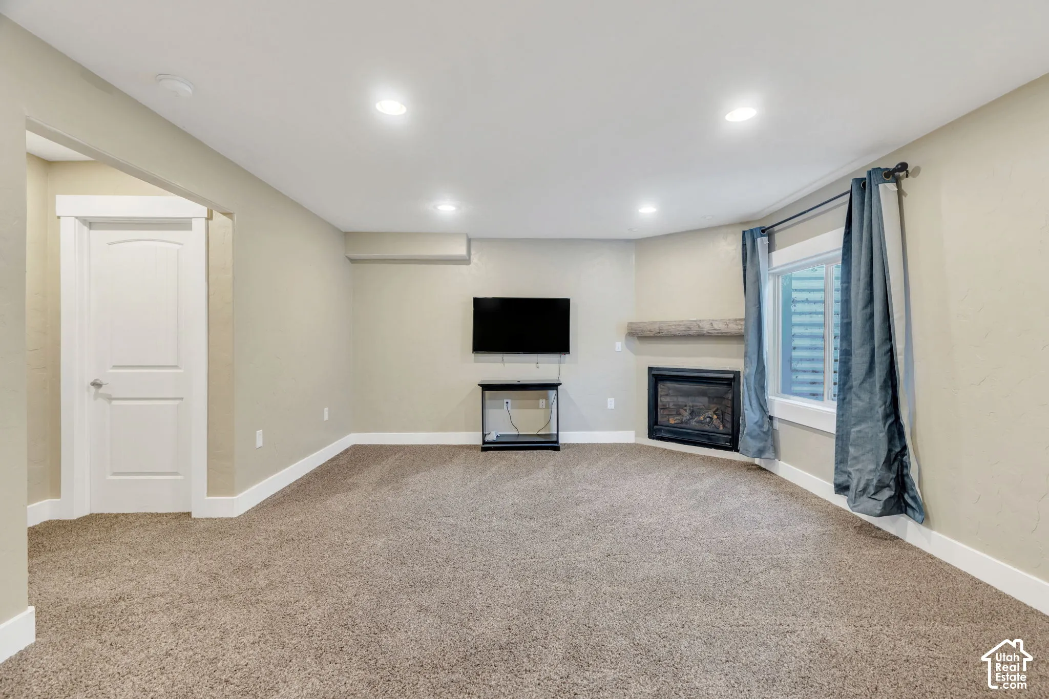 Recreation room has a gas fireplace
