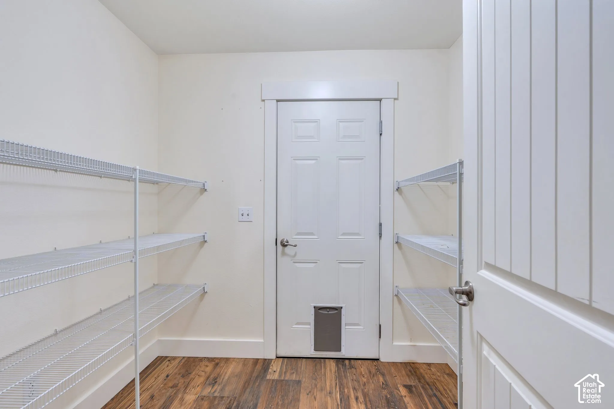 Walkthrough pantry between kitchen and garage