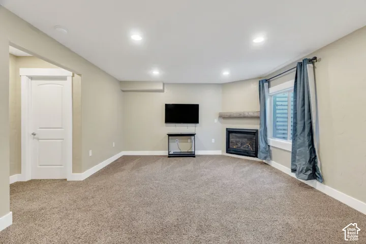 Recreation room has a gas fireplace