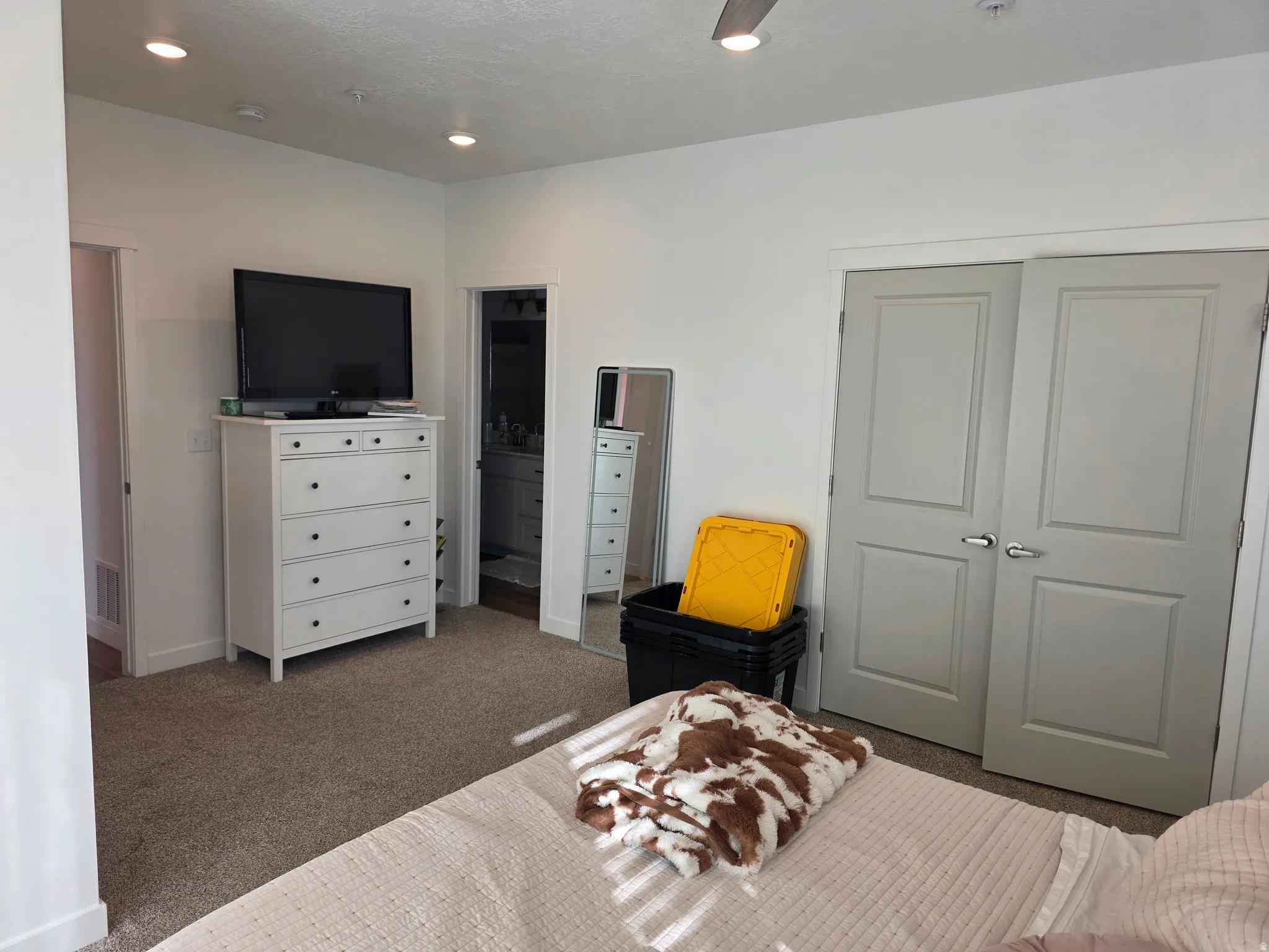 Master Bedroom with carpet floors, a closet, and recessed lighting