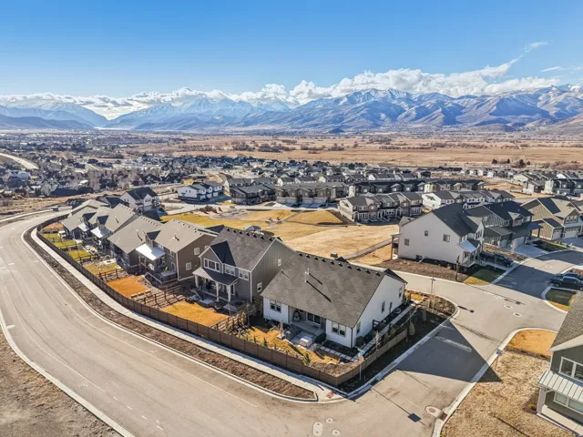 Aerial perspective of suburban area featuring mountains