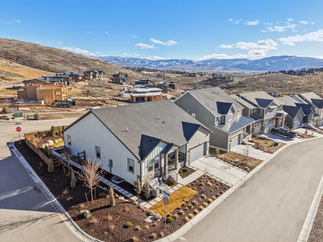 Aerial view of residential area with mountains