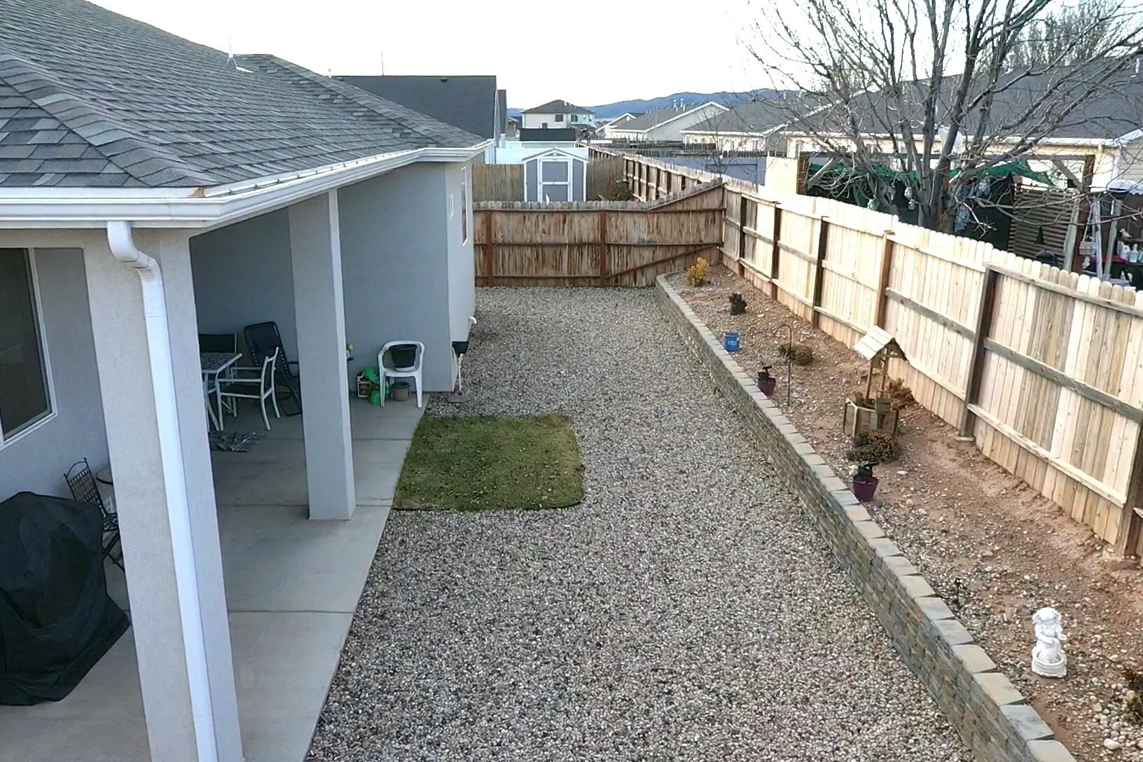 View of fenced backyard