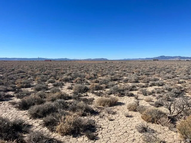 View of mountain backdrop featuring a desert landscape and rural landscape