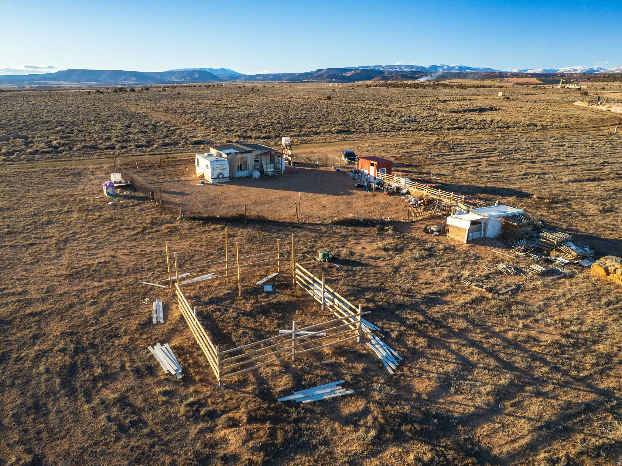 Aerial view of sparsely populated area with mountains