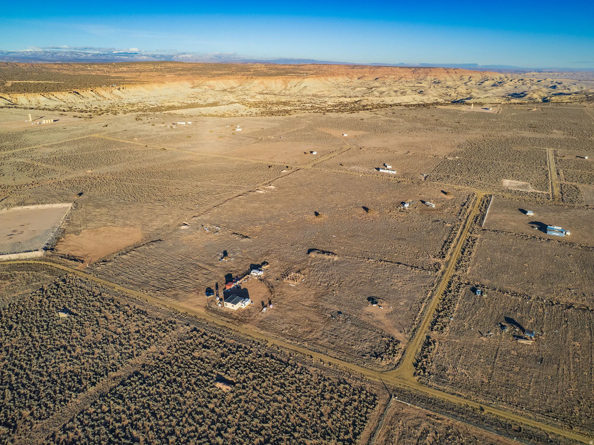 Aerial view of property's location with rural landscape and a desert landscape
