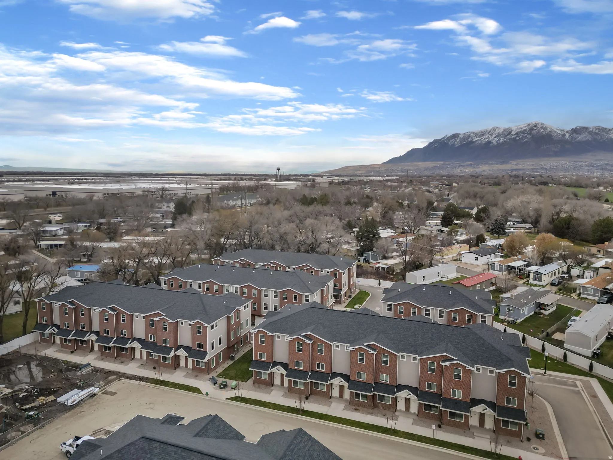 Aerial view of residential area with a mountain backdrop