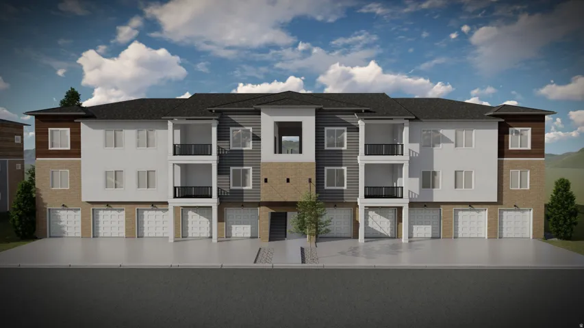 View of building exterior with a residential view and a garage