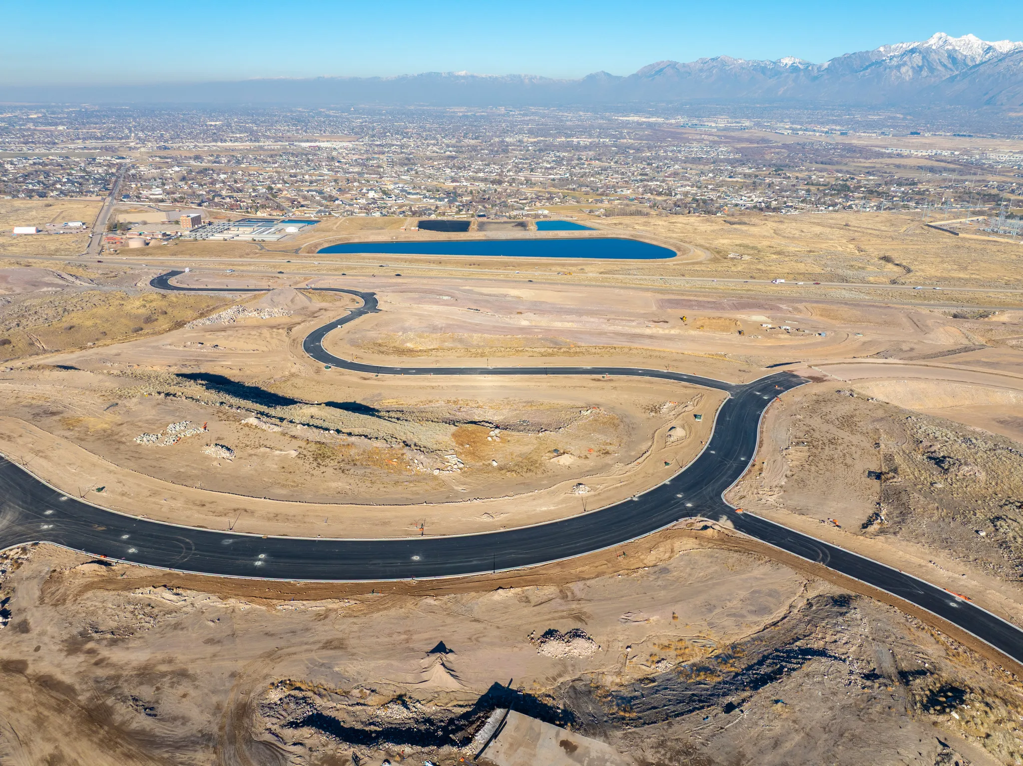 View of property location featuring a mountainous background and a desert landscape