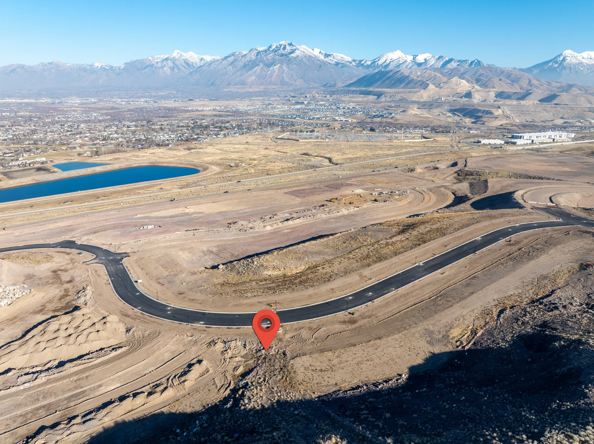 Aerial overview of property's location with mountains
