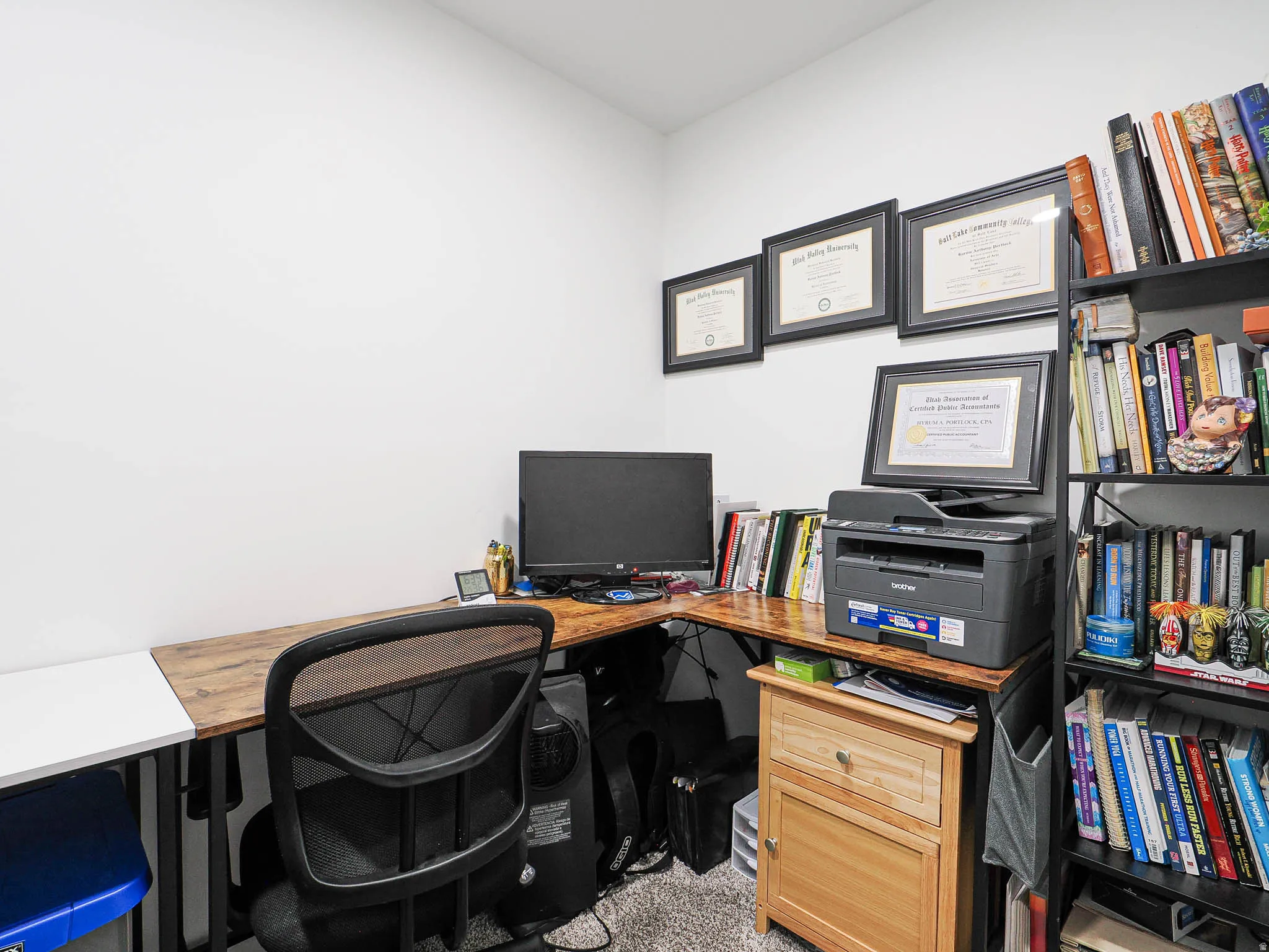 Home office featuring light carpet