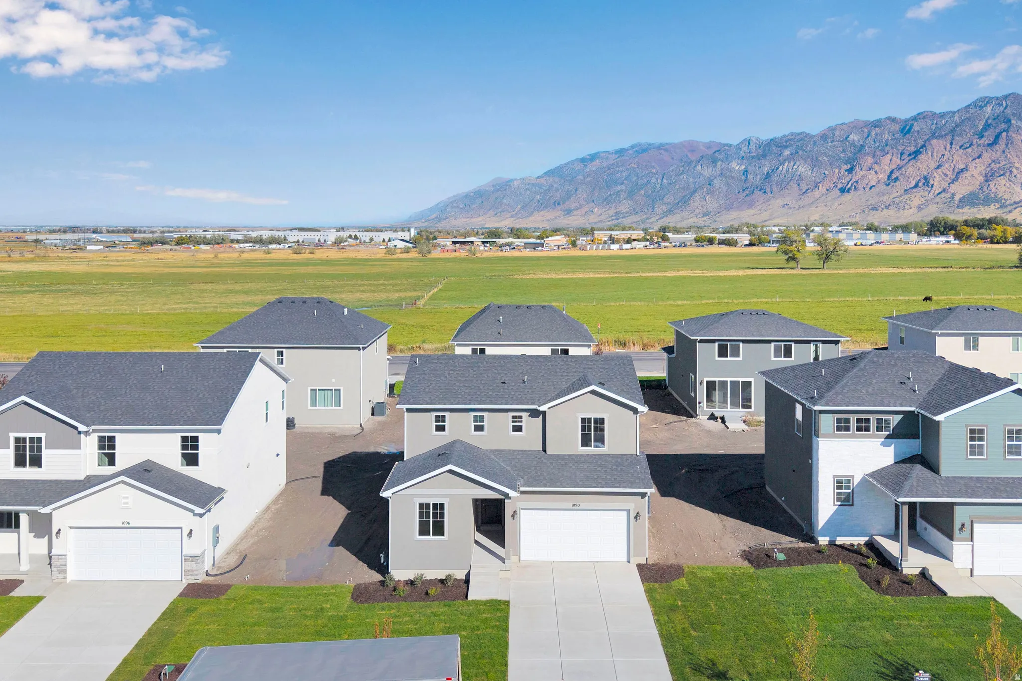 Aerial view of residential area with mountains