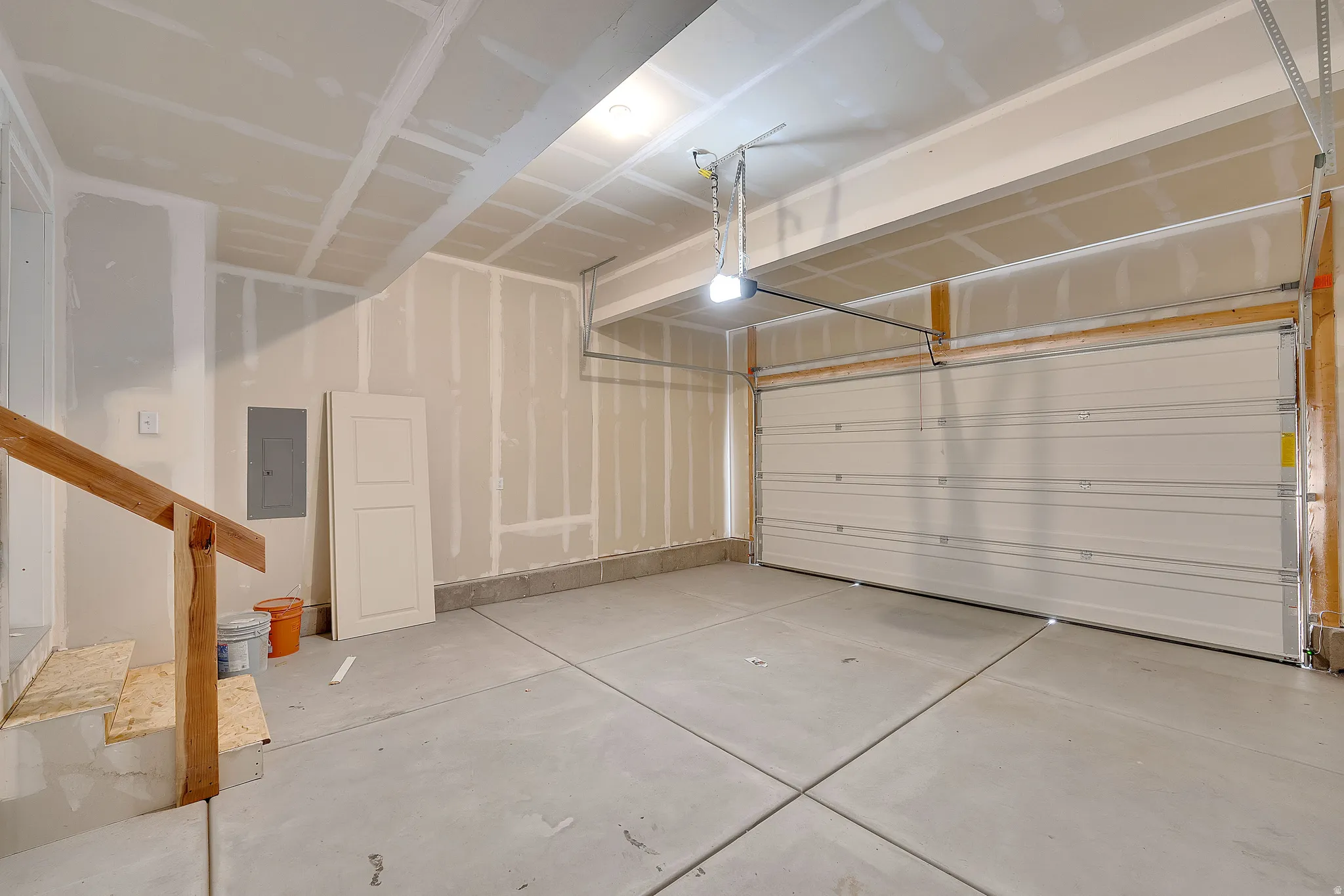 Garage featuring electric panel