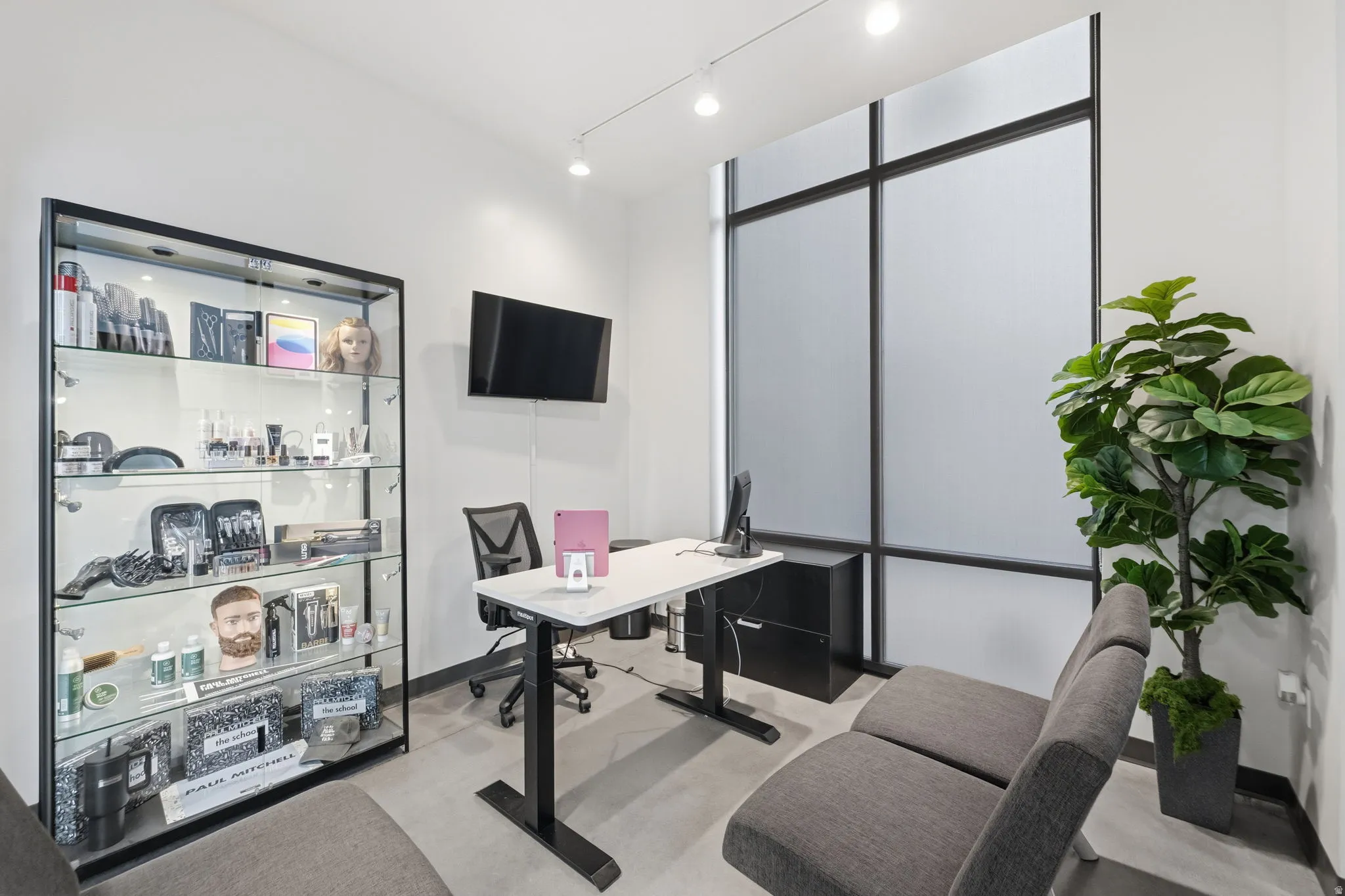 Office space featuring rail lighting