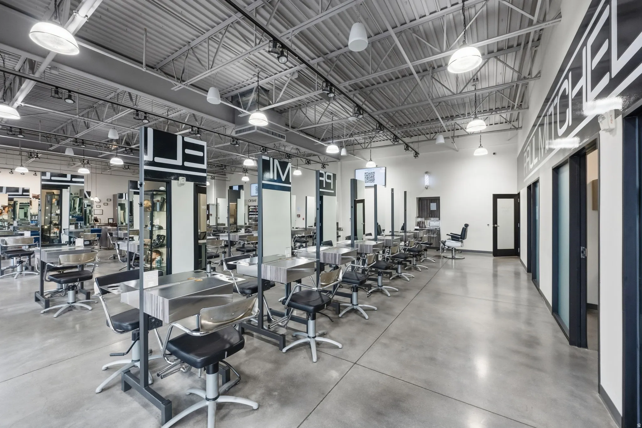 Workout area with a towering ceiling