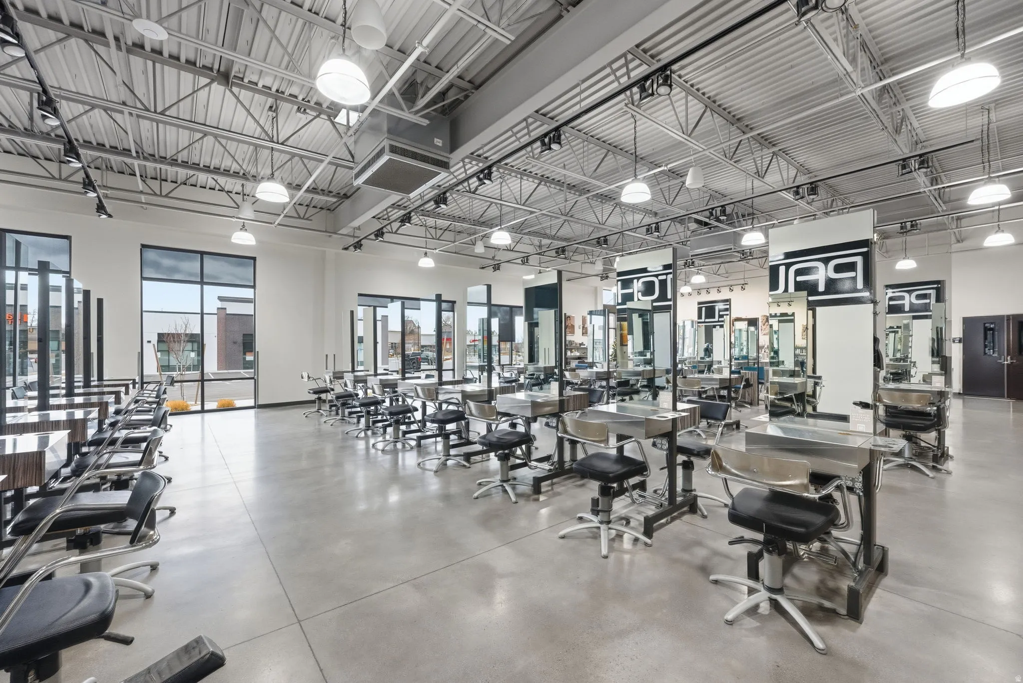 Exercise room featuring a high ceiling